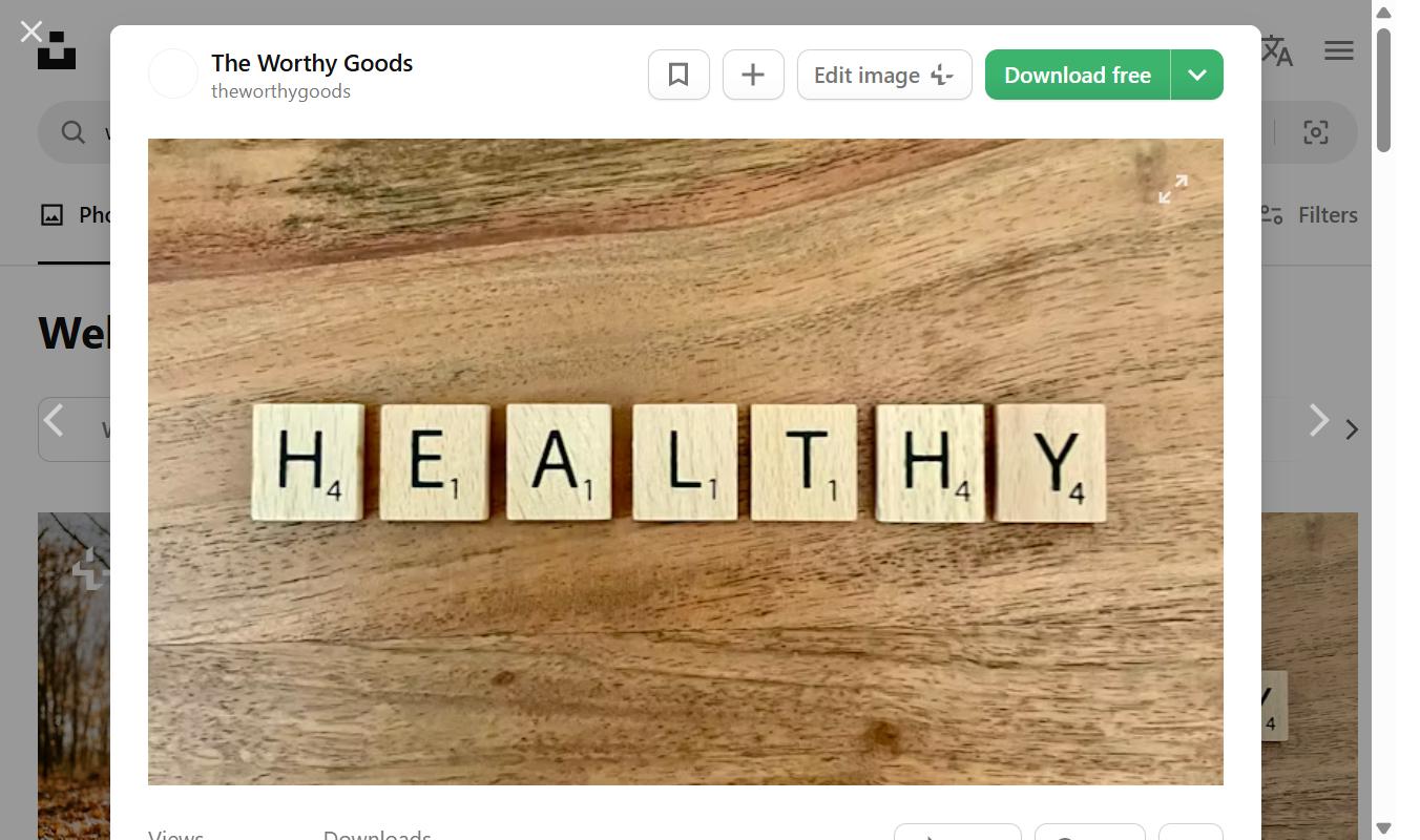 HEALTHY scrabble tiles representing wellbeing and self care lifestyle