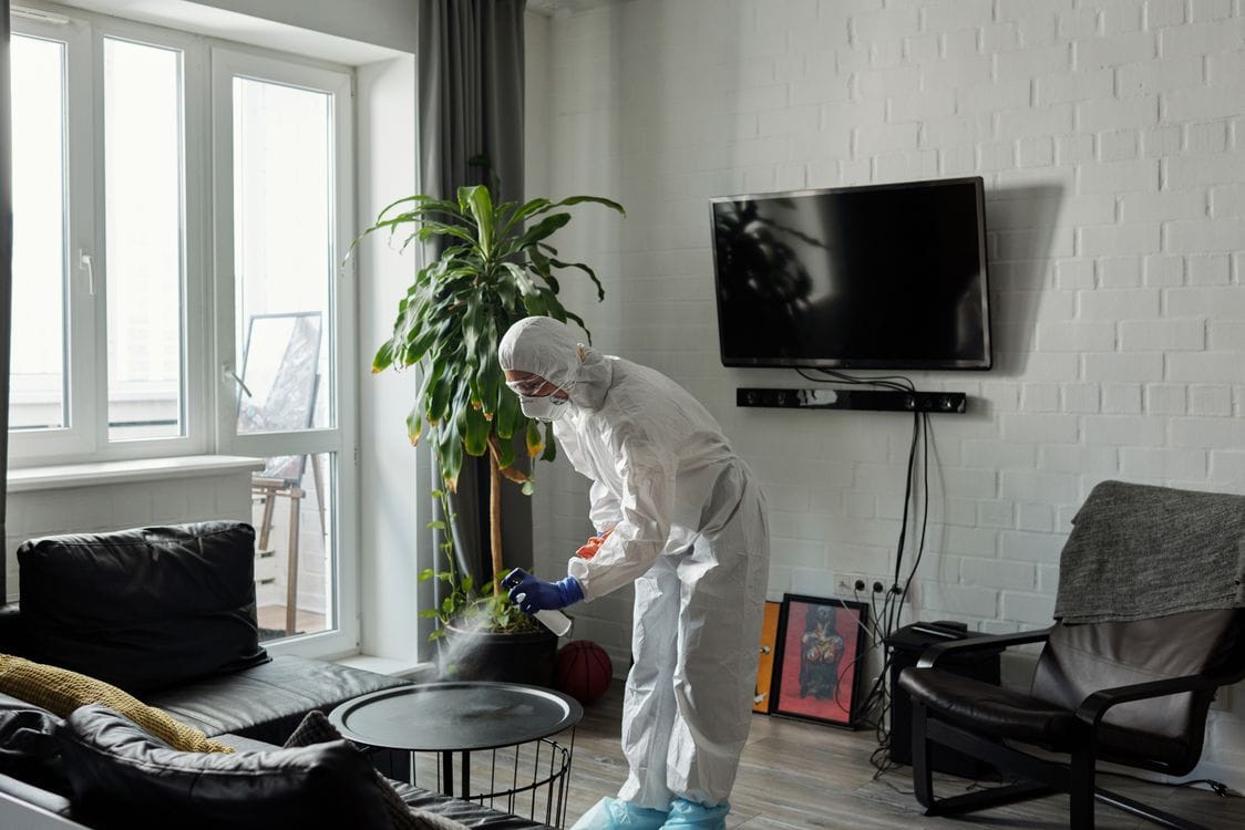 tired woman sitting at home — emotional labour in relationships women